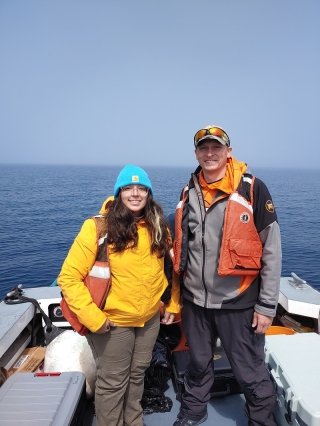 Grunert and Sophia Volak, an undergraduate researcher working with Grunert at Cleveland State University, pause for a photo while collecting bio-optical data across the Ontonagon River – Lake Superior coastal continuum in July 2022. 